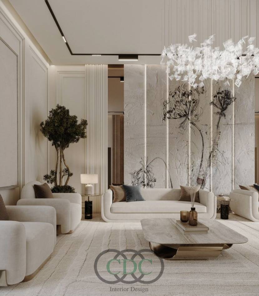 a living room with white furniture and a white chandelier